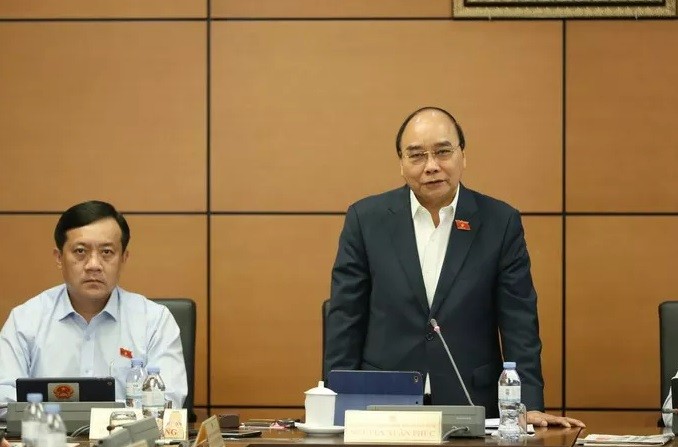 Chủ tịch nước Nguyễn Xuân Phúc: Doanh nghiệp và người dân cả nước còn khó khăn