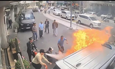 Pha giải cứu ngoạn mục: Nhân viên khách sạn kéo tài xế kẹt trong taxi đang bốc cháy ra ngoài an toàn