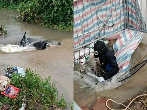 Hiện trường tìm kiếm nam sinh viên nghi bị nước cuốn xuống cống ở Hà Nội