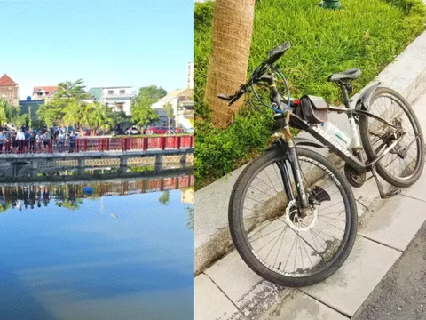 Hiện trường vụ tìm thấy thi thể người đàn ông dưới hồ Bảy Mẫu, xe đạp và dép tìm thấy trên bờ